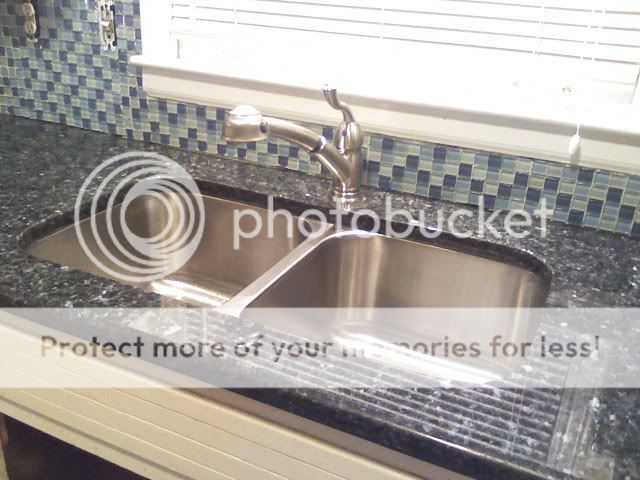 Faucet, sink, and backsplash